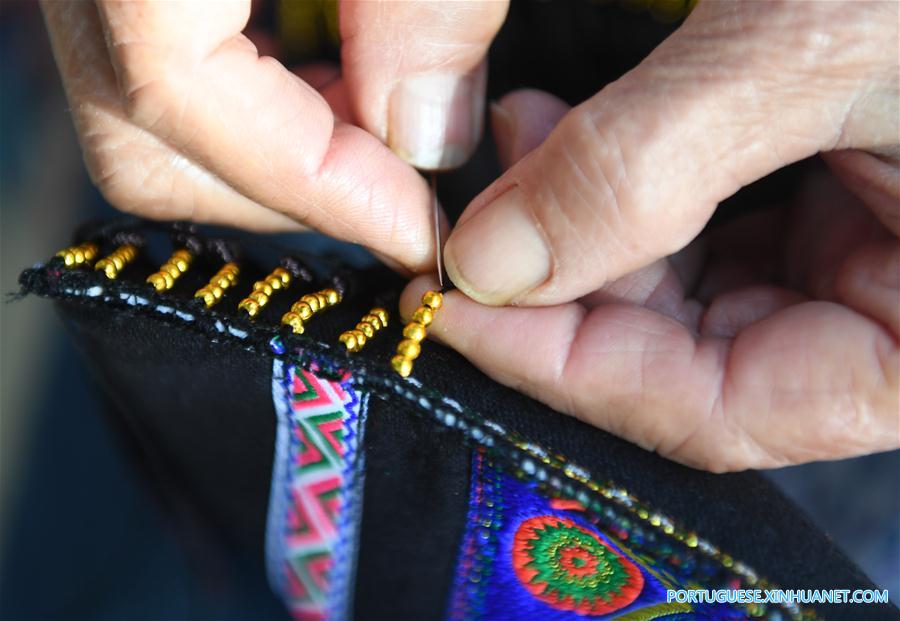 CHINA-GUANGXI-ZHUANG ETHNIC GROUP-COLORED EMBROIDERY (CN)
