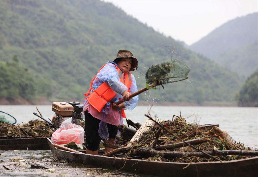 #CHINA-HUNAN-ZHANGJIAJIE-RIVER-CLEARING