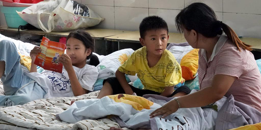 Fotos: abrigo temporário para vítimas de inundações em Henan