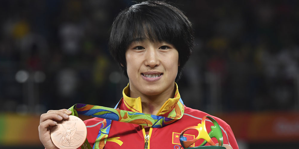 China ganha primeira medalha de luta na Rio 2016