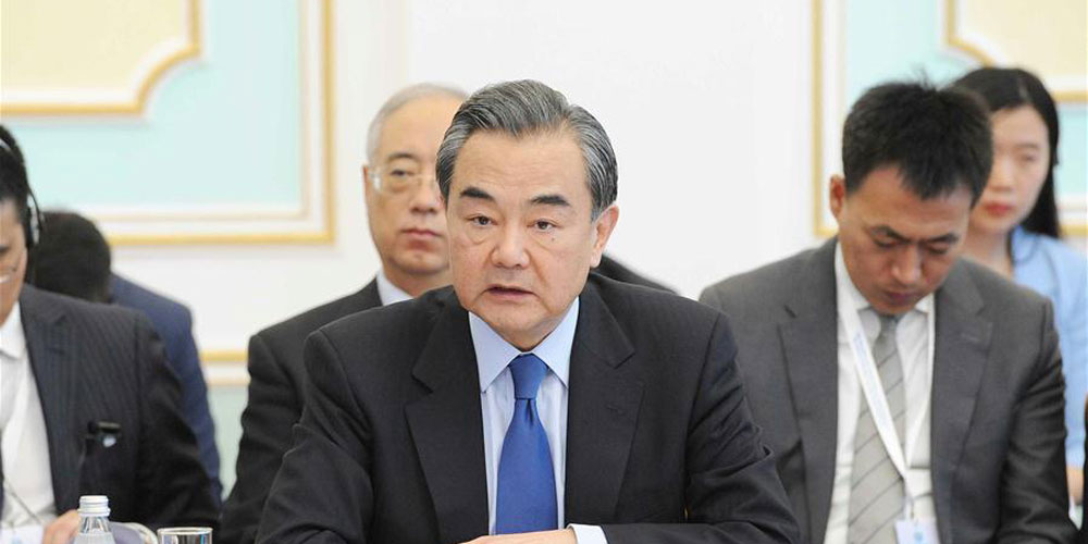 Chanceler chinês pede que membros da OCS promovam cooperação em política, segurança 
e economia