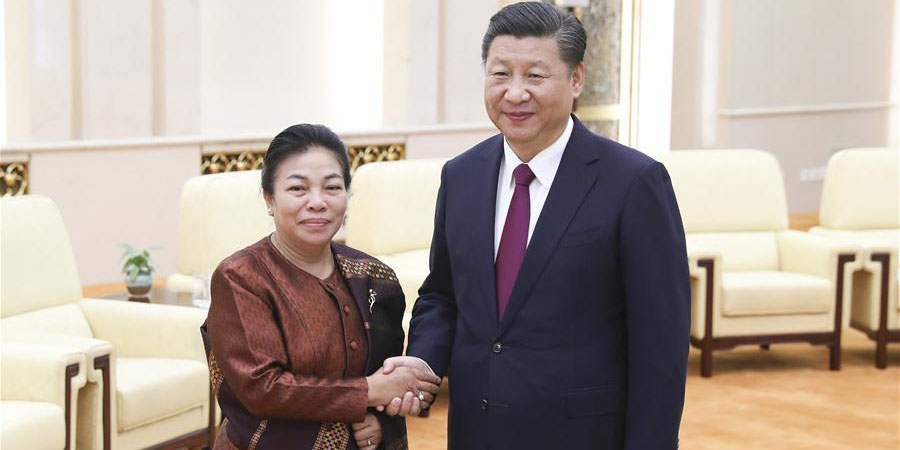 Partidos governantes da China e Laos prometem maior cooperação para relações mais 
estreitas