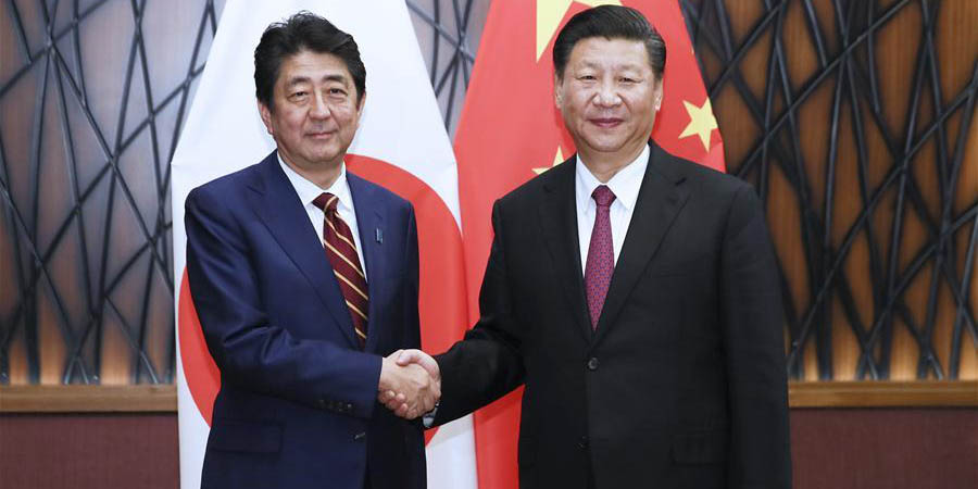 Xi pede a Abe que tome mais ações práticas para melhorar laços China-Japão