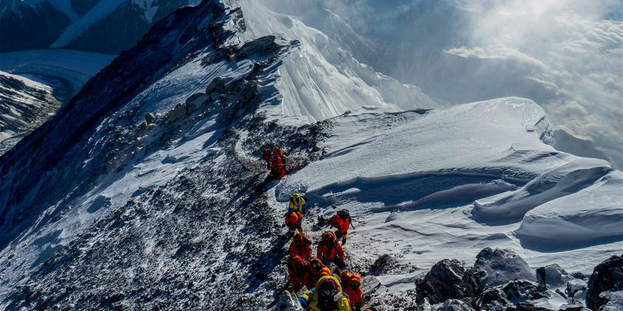 Fotos: A carreira de fotografia de Zhaxi Cering começa no topo do Monte Qomolangma