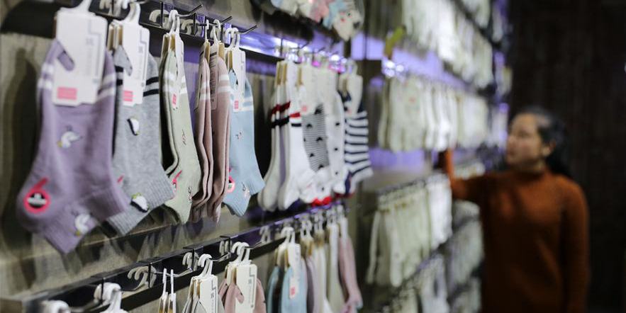 Vila de Xiaobeihe, no nordeste da China, ganha 3 bilhões de yuans da indústria de meias em 2019