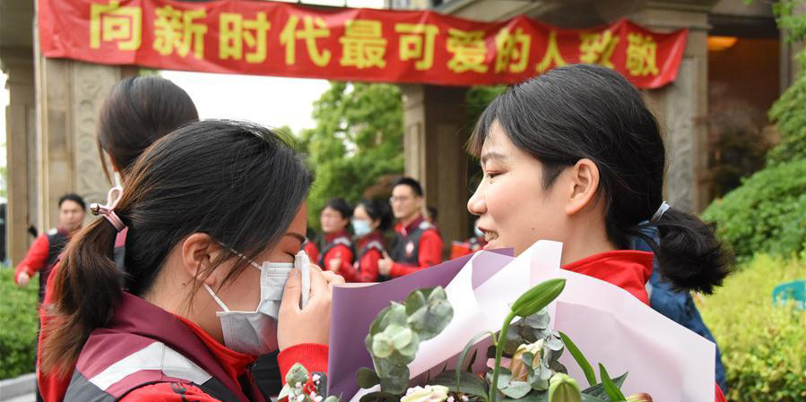 Último lote de profissionais médicos de Zhejiang termina a quarentena de 14 dias