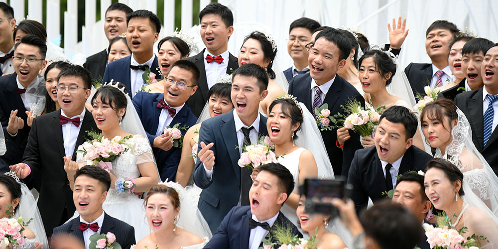 Fotos: casamento coletivo realizado para guerreiros de saúde contra a COVID-19 em Jilin