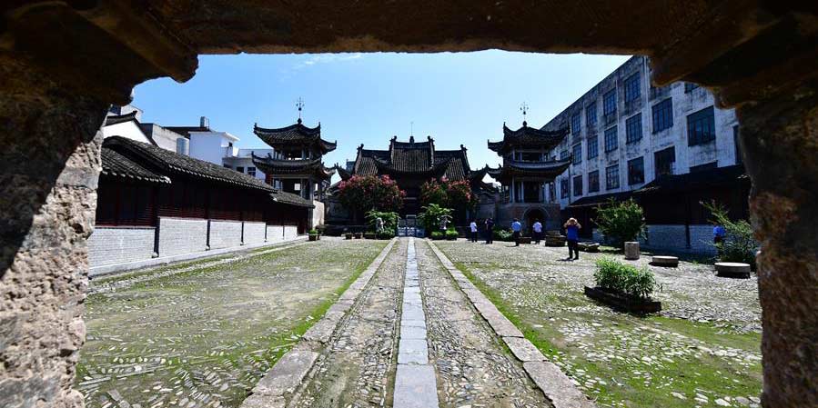 Fotos: antigos edifícios residenciais no distrito de Xichuan, centro da China